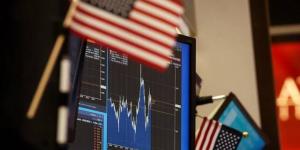 ارتفاع "داو جونز" بدعم نتائج الأعمال الإيجابية وتراجع أسعار النفط